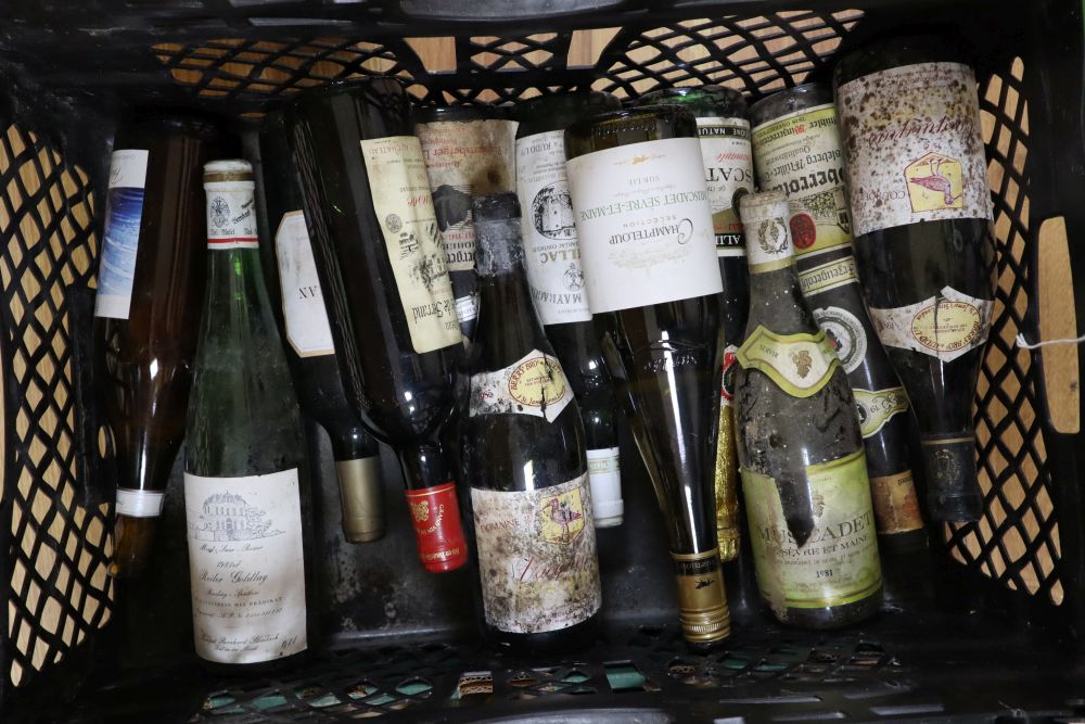 Twenty four bottles of assorted wines and ports